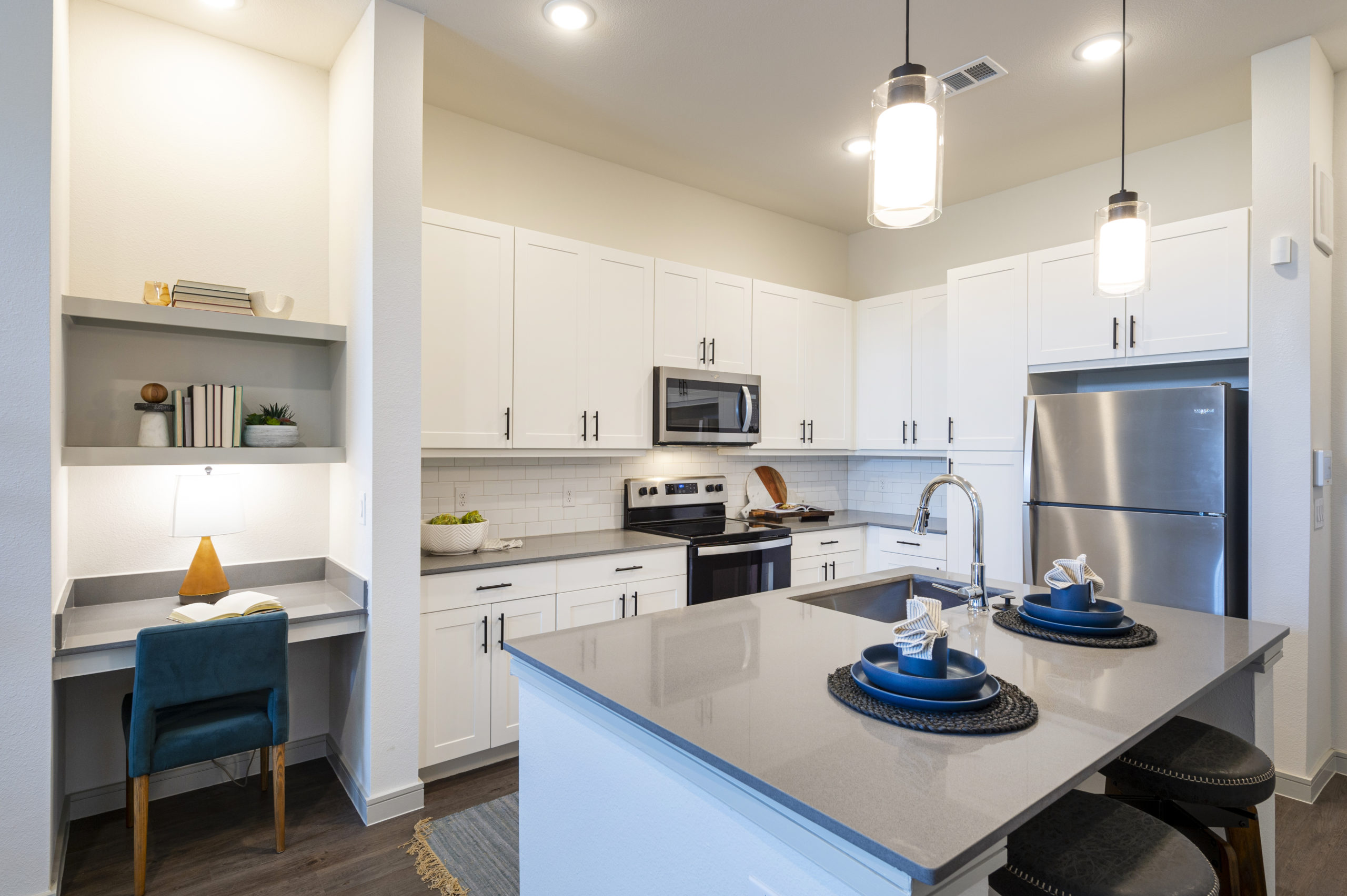 Kitchen and built in desk at The Waterview in Richmond, Texas
