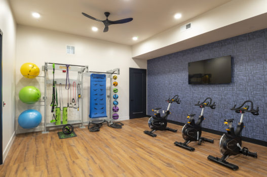 Interactive Fitness Center with Wellbeats™ Virtual Fitness and Spin Room at The Waterview in Richmond, Tx