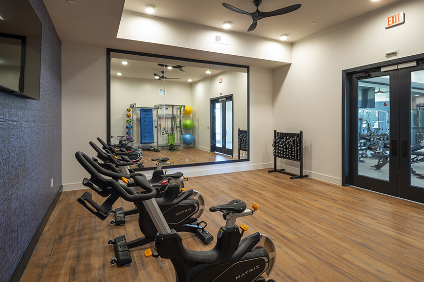 Interactive Fitness Center with Wellbeats™ Virtual Fitness and Spin Room at The Waterview in Richmond, Tx